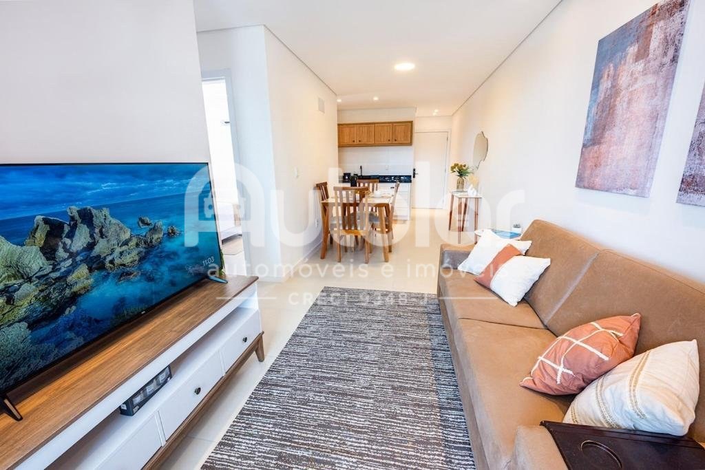 Apartamento à beira-mar com 3 dormitórios
